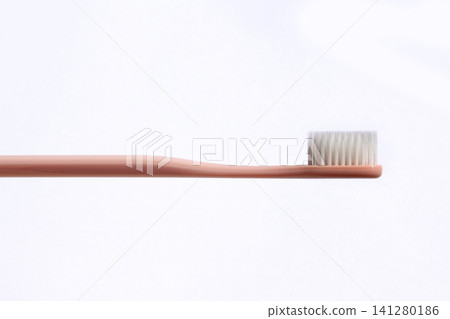 It is a colorful toothbrush. It is a colorful toothbrush. 141280186