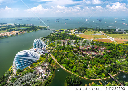 A panoramic view of the lush Gardens by the Bay from the SkyPark at Marina Bay Sands in Singapore. A panoramic view of the lush Gardens by the Bay from the SkyPark at Marina Bay Sands in Singapore. 141280590