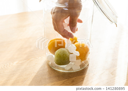 Making plum wine Making plum wine 141280895