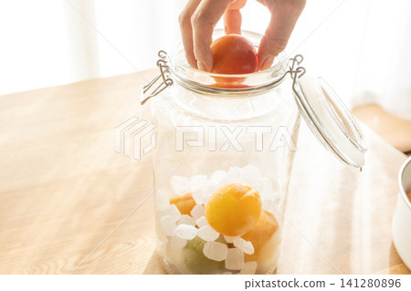 Making plum wine Making plum wine 141280896