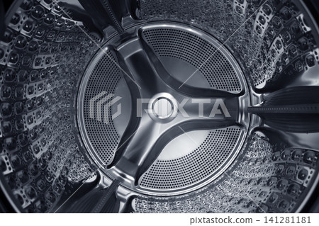 Inside of the washing machine drum . 141281181