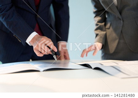 Hands of business people having a meeting Hands of business people having a meeting 141281480