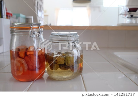 Fruit syrup and plum syrup Fruit syrup and plum syrup 141281737