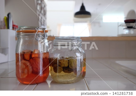 Fruit syrup and plum syrup Fruit syrup and plum syrup 141281738