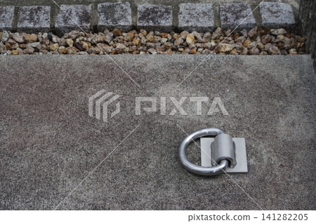 Motorcycle anchor installed in the parking lot at my home. Motorcycle anchor installed in the parking lot at my home. 141282205