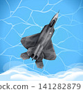Stealth Fighter Jet Flying Through Blue Sky and White Clouds 141282879