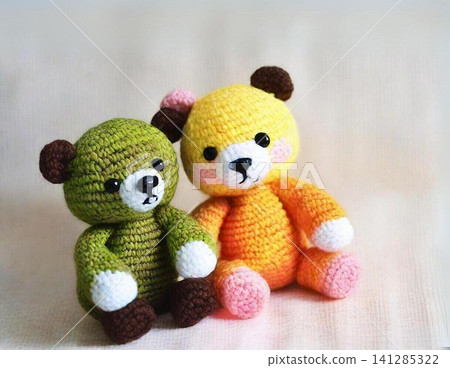 Matcha-colored and orange knitted bear Matcha-colored and orange knitted bear 141285322