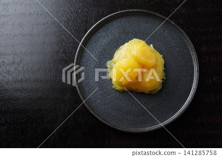 New Year's dishes: Chestnut paste (Kurikinton) - Black background New Year's dishes: Chestnut paste (Kurikinton) - Black background 141285758