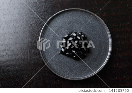 New Year's dishes: Black beans (black background) New Year's dishes: Black beans (black background) 141285760