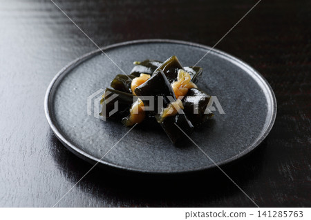 New Year's dishes: Kombu rolls (on a black background) 141285763