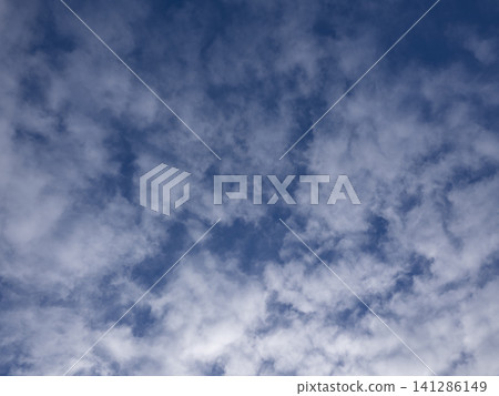 Dramatic cloudscape with puffy clouds Dramatic cloudscape with puffy clouds 141286149