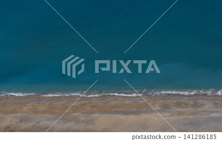 blue sea and sandy beach blue sea and sandy beach 141286185