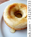 Homemade honey baked donuts 141287333