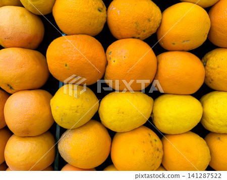Healthy oranges and lemons at a grocery market stall 141287522