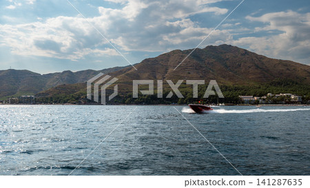 Scenic view of a rocky island coast in Marmaris Turkey Scenic view of a rocky island coast in Marmaris Turkey 141287635
