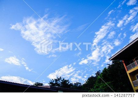 vivid blue sky with clouds vivid blue sky with clouds 141287757