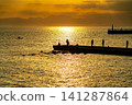 [Kanagawa Prefecture] Enoshima Island bathed in beautiful colors at sunset 141287864