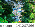 [Kanagawa Prefecture] The townscape of Enoshima visible through the trees 141287866