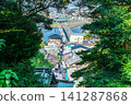 [Kanagawa Prefecture] The townscape of Enoshima visible through the trees 141287868