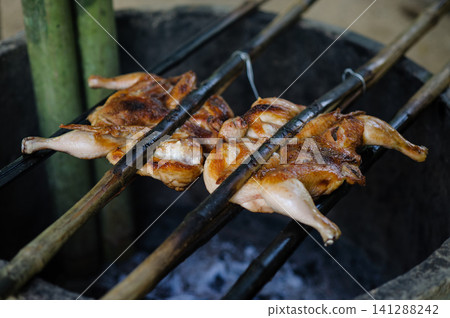 thai style roasted chicken thai style roasted chicken 141288242