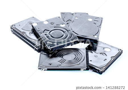 tons of non-function harddisk on white background tons of non-function harddisk on white background 141288272
