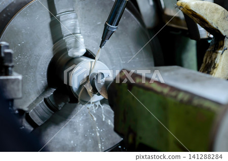 an industrial milling drilling machine is processed at the factory site an industrial milling drilling machine is processed at the factory site 141288284