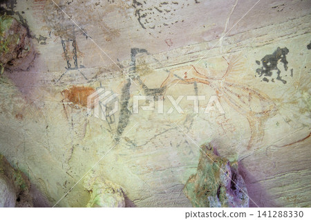 prehistoric paintings on the stone of the cave wall prehistoric paintings on the stone of the cave wall 141288330