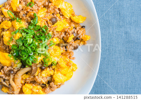 Mapo Egg: Chinese-style egg stir-fry with minced meat and shimeji mushrooms. Mapo Egg: Chinese-style egg stir-fry with minced meat and shimeji mushrooms. 141288515