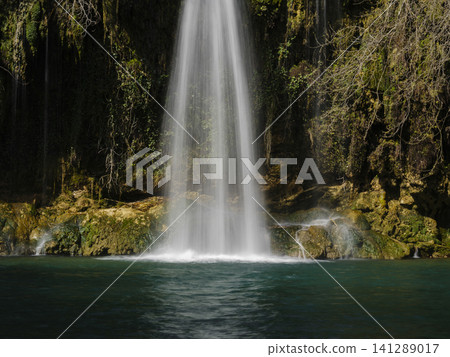 beautiful waterfall in the forest beautiful waterfall in the forest 141289017