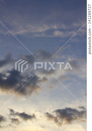 It is an atmospheric sunset sky. 141289727
