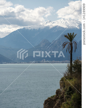 snowy mountain and beautiful seascape snowy mountain and beautiful seascape 141289909