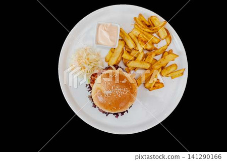 Hamburger meal with french fries and coleslaw on plate Hamburger meal with french fries and coleslaw on plate 141290166
