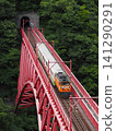 The Kurobe Gorge Railway crosses the Shin-Yamahiko Bridge. 141290291