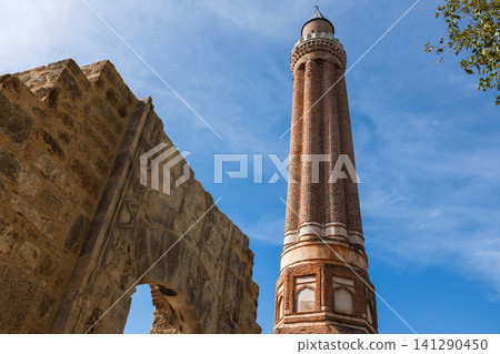 layers of history with roman architecture and a turkish minaret layers of history with roman architecture and a turkish minaret 141290450