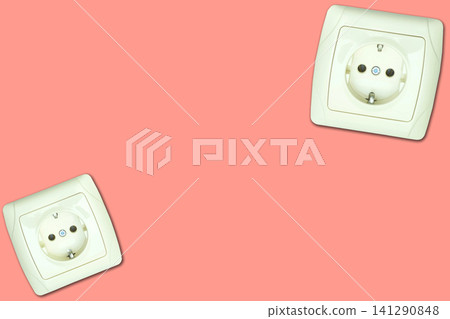 Two electrical plug socket for connecting devices on pink Two electrical plug socket for connecting devices on pink 141290848