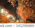 The illuminated cherry blossom trees and the light trails of cars driving along the Sai River at night 141290860