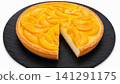Peach Cheesecake with Fresh Peach Topping on White Background 141291175