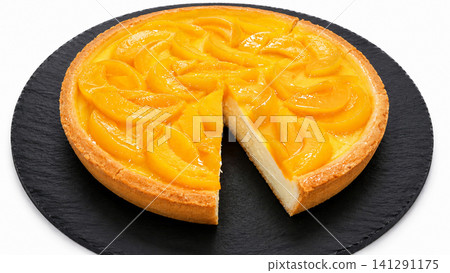 Peach Cheesecake with Fresh Peach Topping on White Background Peach Cheesecake with Fresh Peach Topping on White Background 141291175