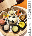 Dim sum served in a bamboo steamer 141291224