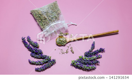 lavender flower in a wooden spoon 141291634