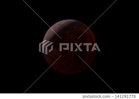 A total lunar eclipse with a turquoise fringe. A total lunar eclipse with a turquoise fringe. 141291778