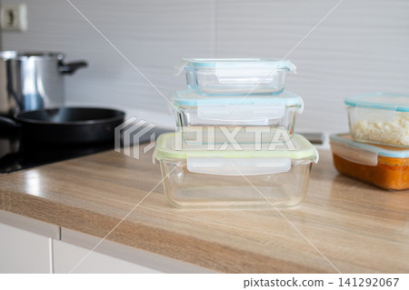 Stack of empty glass food storage containers Stack of empty glass food storage containers 141292067