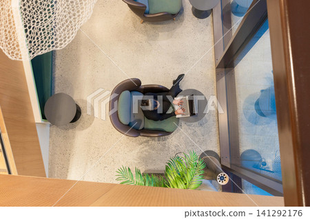 Overhead view of person working Overhead view of person working 141292176