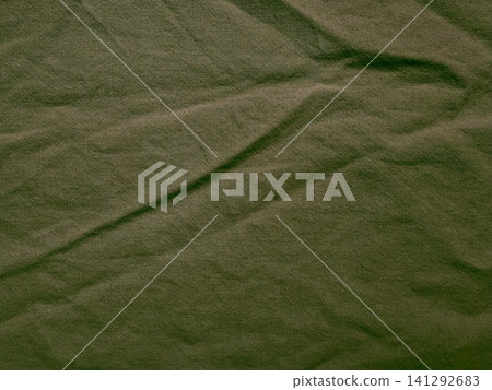 olive green crumpled linen fabric texture background with organic folds and rustic sustainable textile material aesthetic olive green crumpled linen fabric texture background with organic folds and rustic sustainable textile material aesthetic 141292683