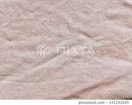 natural dusty rose crumpled linen fabric texture background with organic folds and woven sustainable material patterns natural dusty rose crumpled linen fabric texture background with organic folds and woven sustainable material patterns 141292685