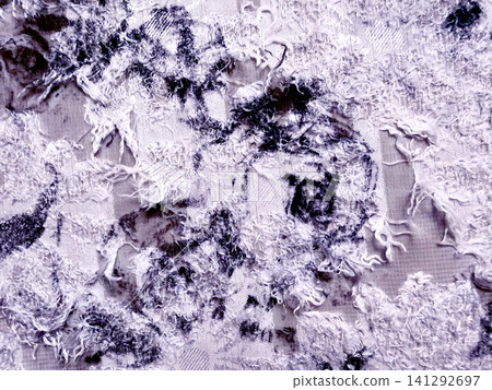 textured distressed fabric background with abstract ink splatters and frayed thread embroidery textured distressed fabric background with abstract ink splatters and frayed thread embroidery 141292697