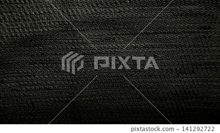dark textured fabric material with fine woven synthetic pattern for industrial design backdrop 141292722