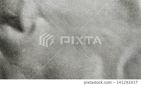 dark gray synthetic fabric texture displays subtle athletic weave pattern under soft studio lighting dark gray synthetic fabric texture displays subtle athletic weave pattern under soft studio lighting 141292837