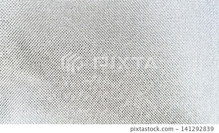 minimalist white woven textile texture reveals organic linen mesh structure creating serene atmospheric backdrop minimalist white woven textile texture reveals organic linen mesh structure creating serene atmospheric backdrop 141292839