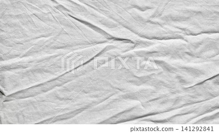 white cotton gauze fabric texture showcases minimalist organic folds in overhead flat lay clean abstract background white cotton gauze fabric texture showcases minimalist organic folds in overhead flat lay clean abstract background 141292841